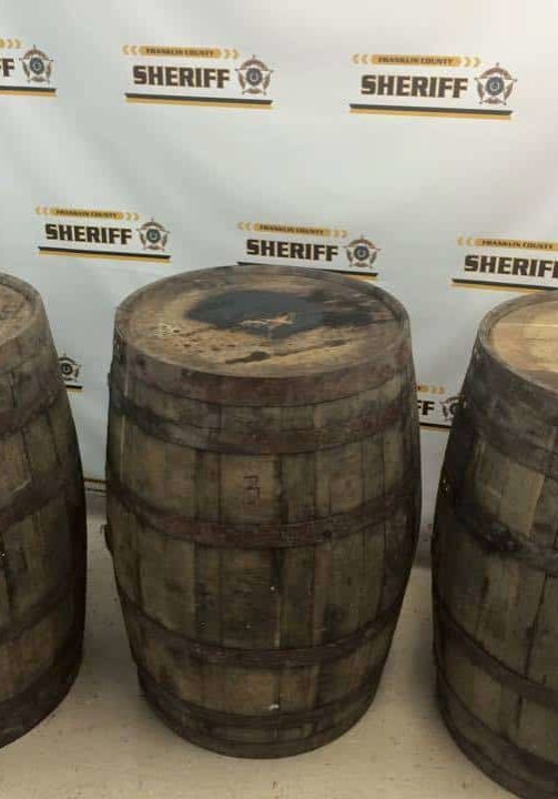 Some of the recovered Wild Turkey barrels filled with bourbon. (image via Franklin County Sheriff)